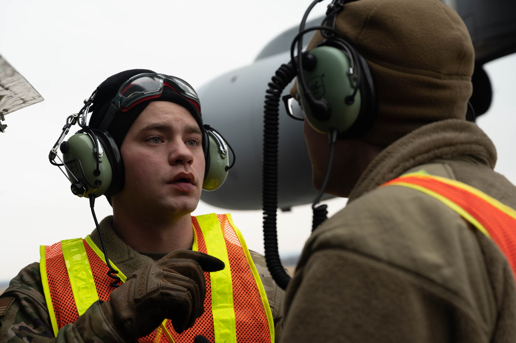 Maintainers share a chat at Rzeszow-Jasionka airport.