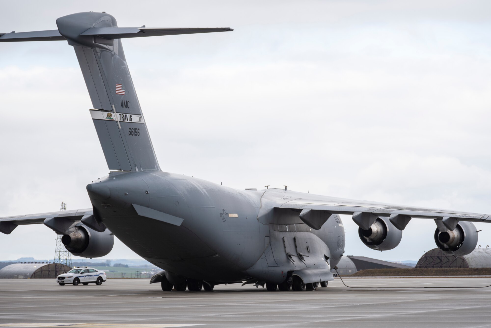 Airmen from the 726th Air Mobility squadron unload cargo from a C-17 Globemaster III aircraft.