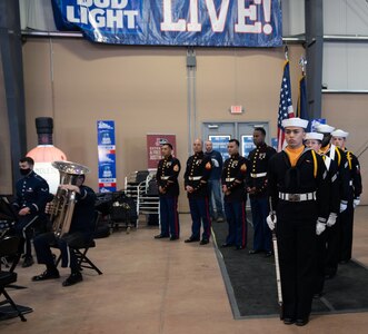 Admiral Provides Oath of Enlistment to Recruits at Rodeo