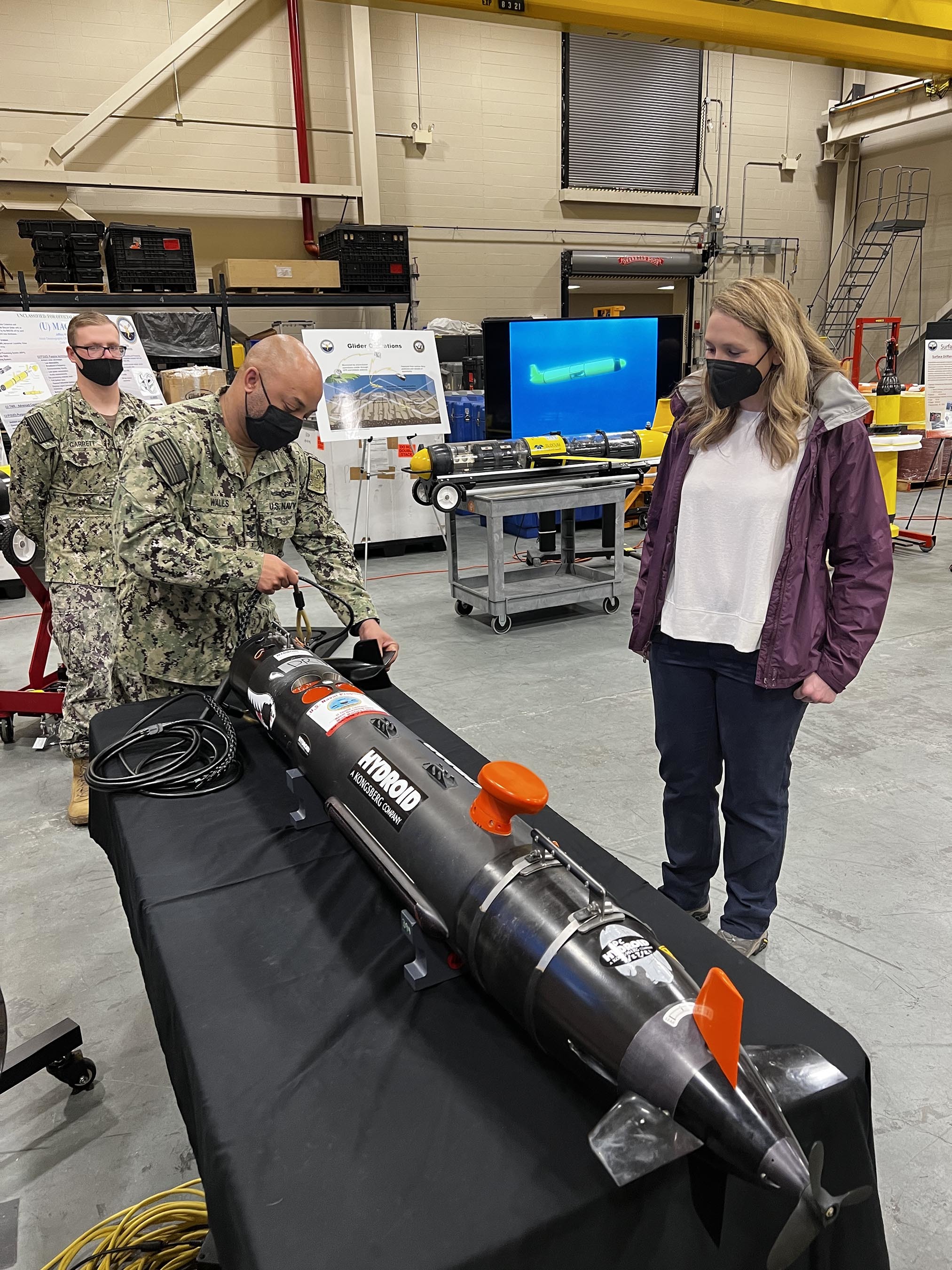 The Honorable Meredith Berger, Assistant Secretary of the Navy for Energy, Installations and Environment and performing the duties of the Under Secretary of the Navy is briefed about Fleet Survey Team’s (FST) mission and UUV capabilities in the oceanographic high bay of FST during her first visit to Naval Oceanography and Meteorology Command (NMOC) at NASA Stennis Space Center, Mississippi, Feb. 3, 2022. Naval Meteorology and Oceanography Command directs and oversees more than 2,500 globally-distributed military and civilian personnel who collect, process and exploit environmental information to assist Fleet and Joint Commanders in all warfare areas to make better decisions faster than the adversary.