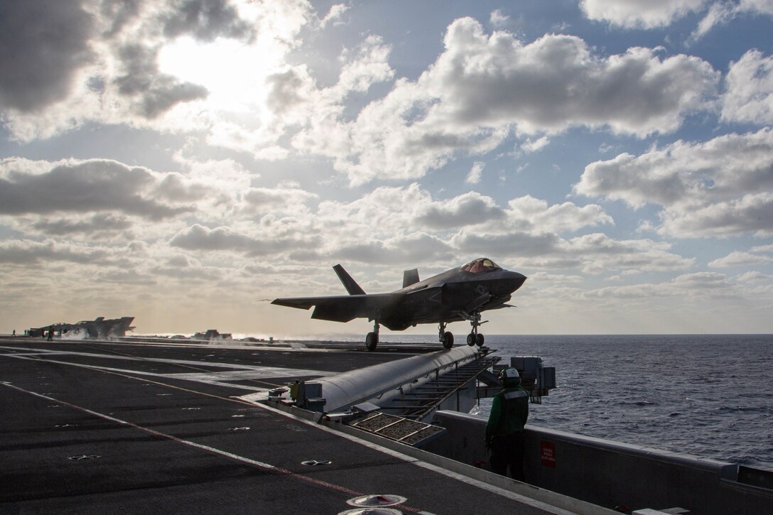 PHILIPPINE SEA Marines of Marine Wing Fighter Attack Squadron 314 launch from the flight deck of the Nimitz-class aircraft carrier USS Abraham Lincoln as they conduct simulated offensive and defensive air operations, as well as close air support training missions in support of Jungle Warfare Exercise 22 across Okinawa, Japan. JWX 22 is large-scale field training exercise focused on leveraging the integrated capabilities of joint and allied partners to strengthen all-domain awareness, maneuver, and fires across a distributed maritime environment. (U.S. Marine Corps photo by Capt. Charles Allen/Released)