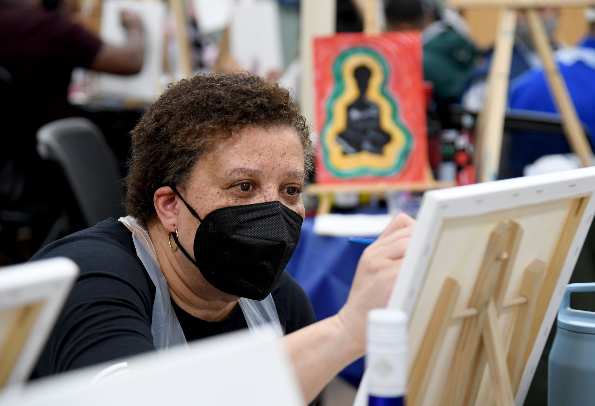 U.S. Air Force Col. Rita DuBoyce, 81st Medical Group graduate medical education director, participates in a paint and sip event inside the Keesler Arts and Crafts Center at Keesler Air Force Base, Mississippi, Feb. 18, 2022. The African-American Heritage and Black History Month Committees hosted the event in celebration of Black History Month, which is celebrated throughout February. (U.S. Air Force photo by Kemberly Groue)