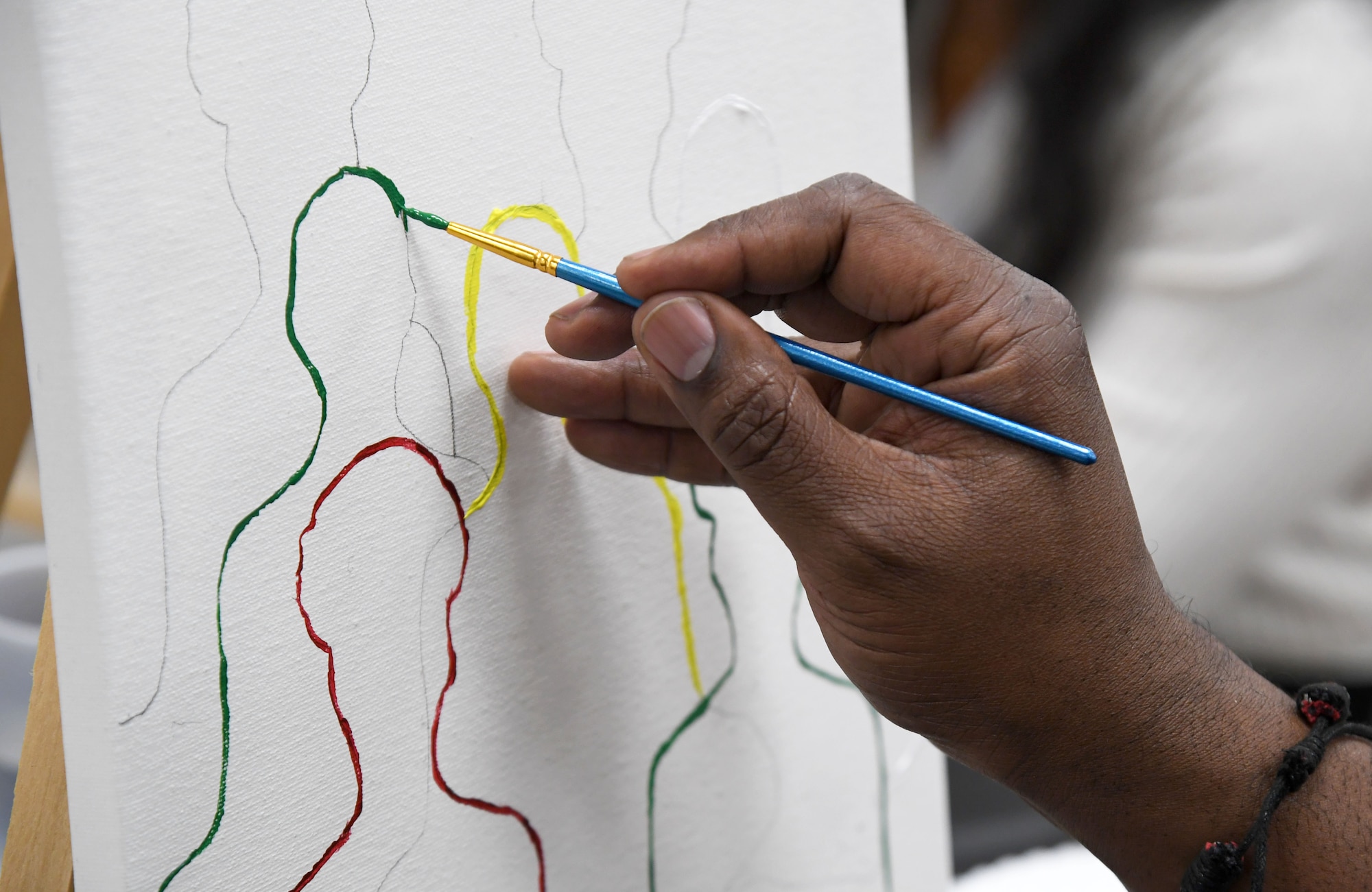 Lawrence Armstrong, Second Air Force finance analyst, participates in a paint and sip event inside the Keesler Arts and Crafts Center at Keesler Air Force Base, Mississippi, Feb. 18, 2022. The African-American Heritage and Black History Month Committees hosted the event in celebration of Black History Month, which is celebrated throughout February. (U.S. Air Force photo by Kemberly Groue)