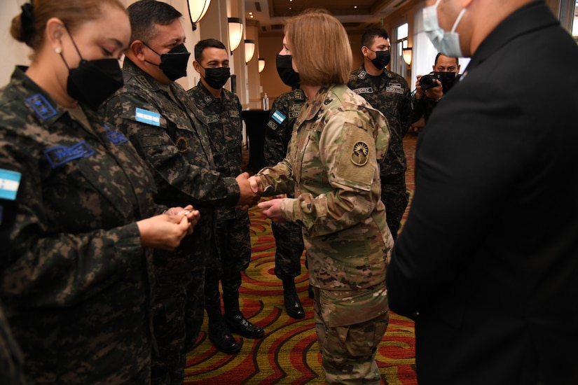 U.S. Army Gen. Laura Richardson, commander of U.S. Southern Command, greets Honduran military members.