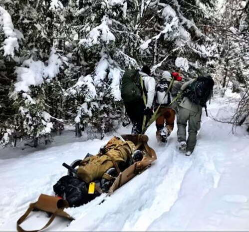 A Defense POW/MIA Accounting Agency investigative team pulls a ground penetrating radar in Poland, January 2022. The team is headed to a possible location of a MIA from WWII. (Courtesy photo)