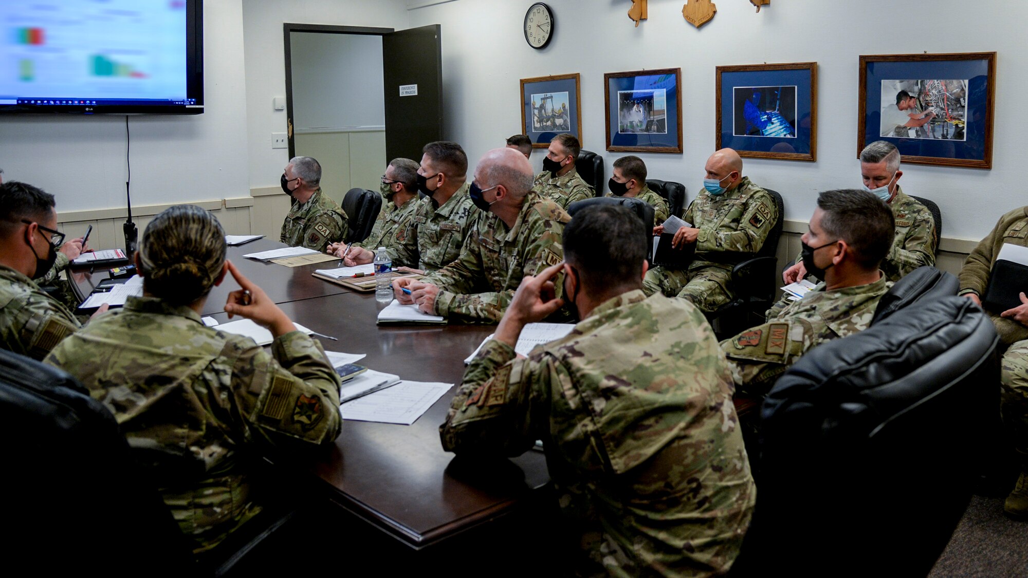 An image of The U.S. Air National Guard's first Production Assessment Team attending a meeting with members of the 177th Fighter Wing