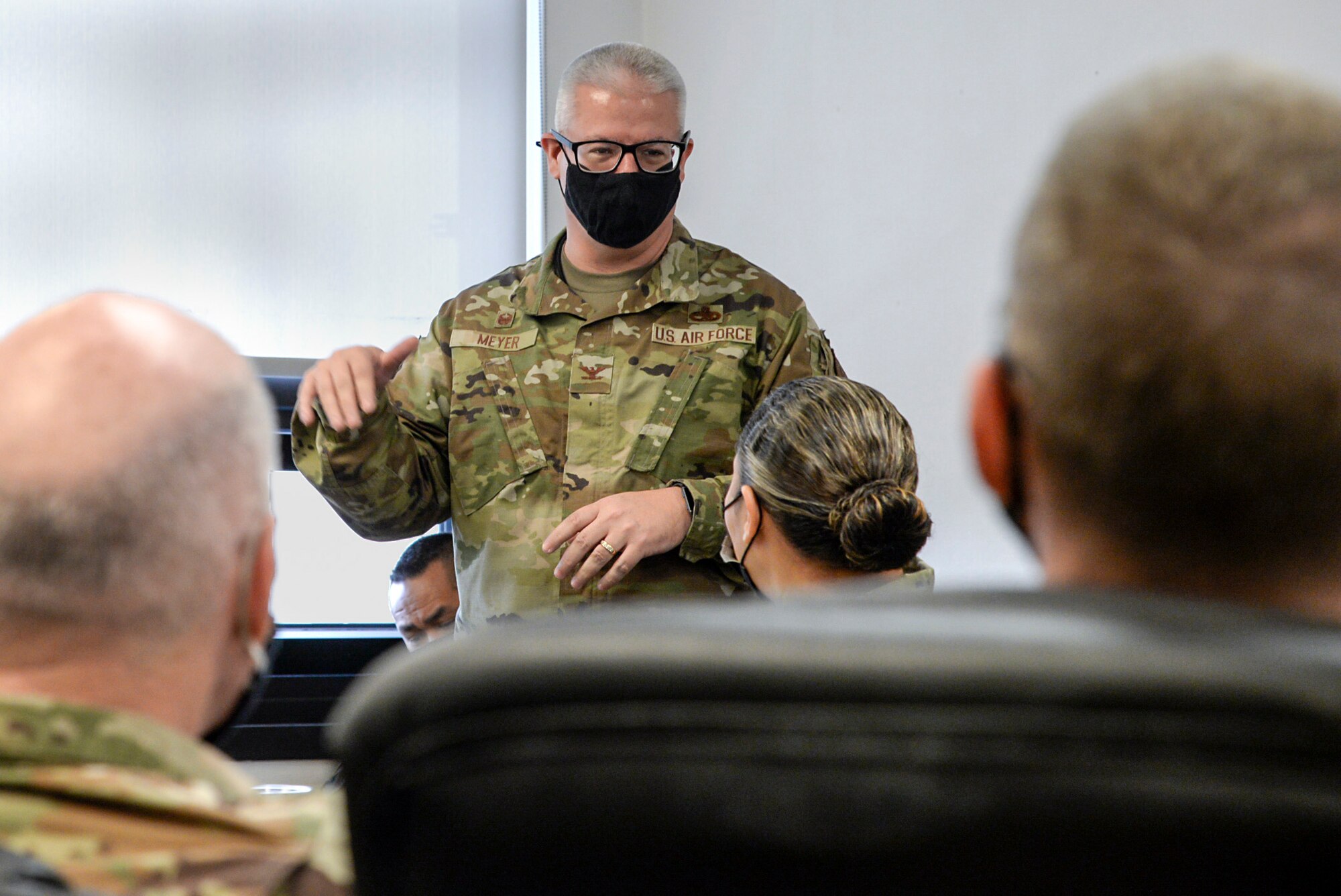 An image of U.S. Air Force Col. Adrian Meyer, Maintenance Group commander with the 169th Fighter Wing, South Carolina Air National Guard, conducting a briefing.