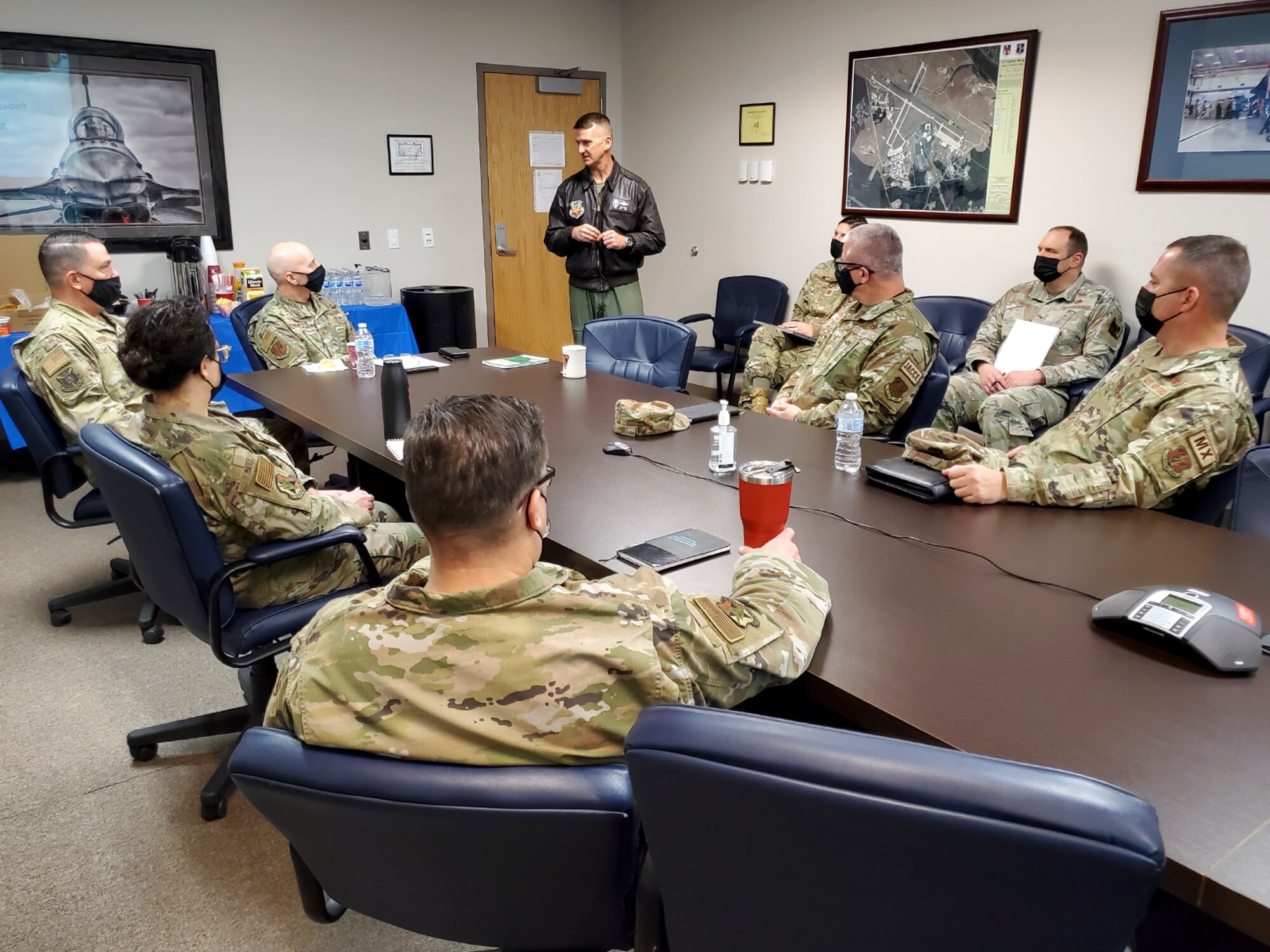 An image of U.S. Air Force Col. Derek B. Routt, commander of the 177th Fighter Wing of the New Jersey Air National Guard, briefing Brig. Gen. Donald K. Carpenter, National Guard Bureau Director of Logistics, Engineering and Force Protection, and senior leadership during the Air National Guard's first Production Assessment Team visit.