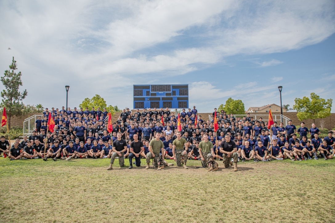 U.S. Marines and future Marines with Recruiting Station Riverside, 12th Marine Corps District, participate during a tug-a-war competition during an annual pool function in Moreno Valley, California, July 24, 2021. The annual pool function is an opportunity for future Marines to build camaraderie, strengthen their commitment to the Marine Corps and prepare for recruit training by competing in athletic competitions and receiving military related periods of instruction. (U.S. Marine Corps photo by Cpl. Ana S. Madrigal)