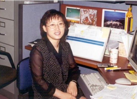 Hyon, Ok Kyong, Far East District program analyst, poses at her workstation for a photo taken at the former FED compound, located in Dongdaemun, 1997. Hyon joined FED on April 5, 1985, as a data transcriber at the Program Support Section, Military Branch, Engineering Division and will retire February 28, 2022, after 37 years of service. (Courtesy photo)