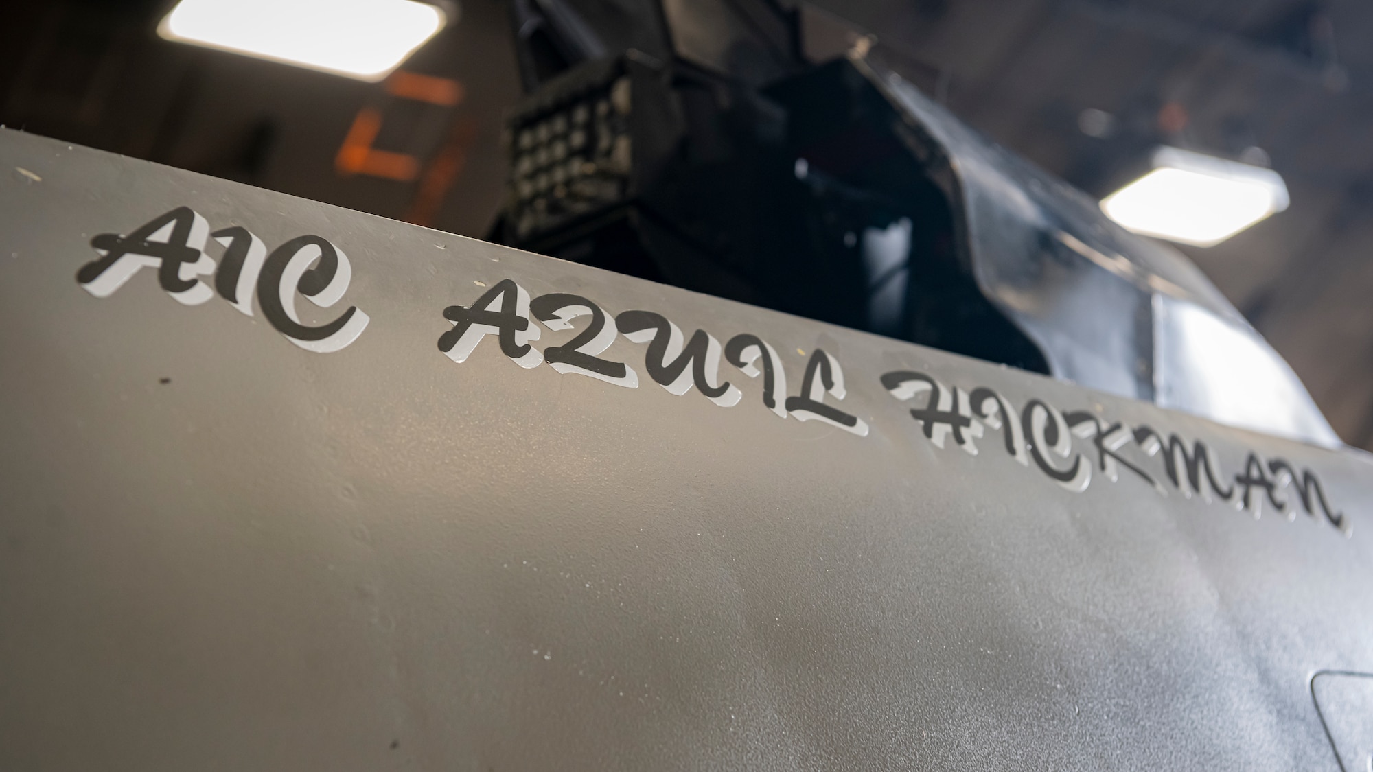 Crew chiefs name painted on the side of a F-16 Fighting Falcon.