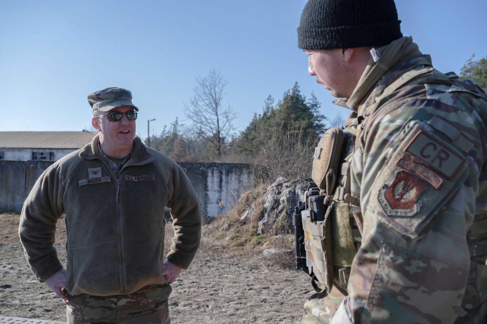 435th CRG commander speaks with 435th SFS defender.