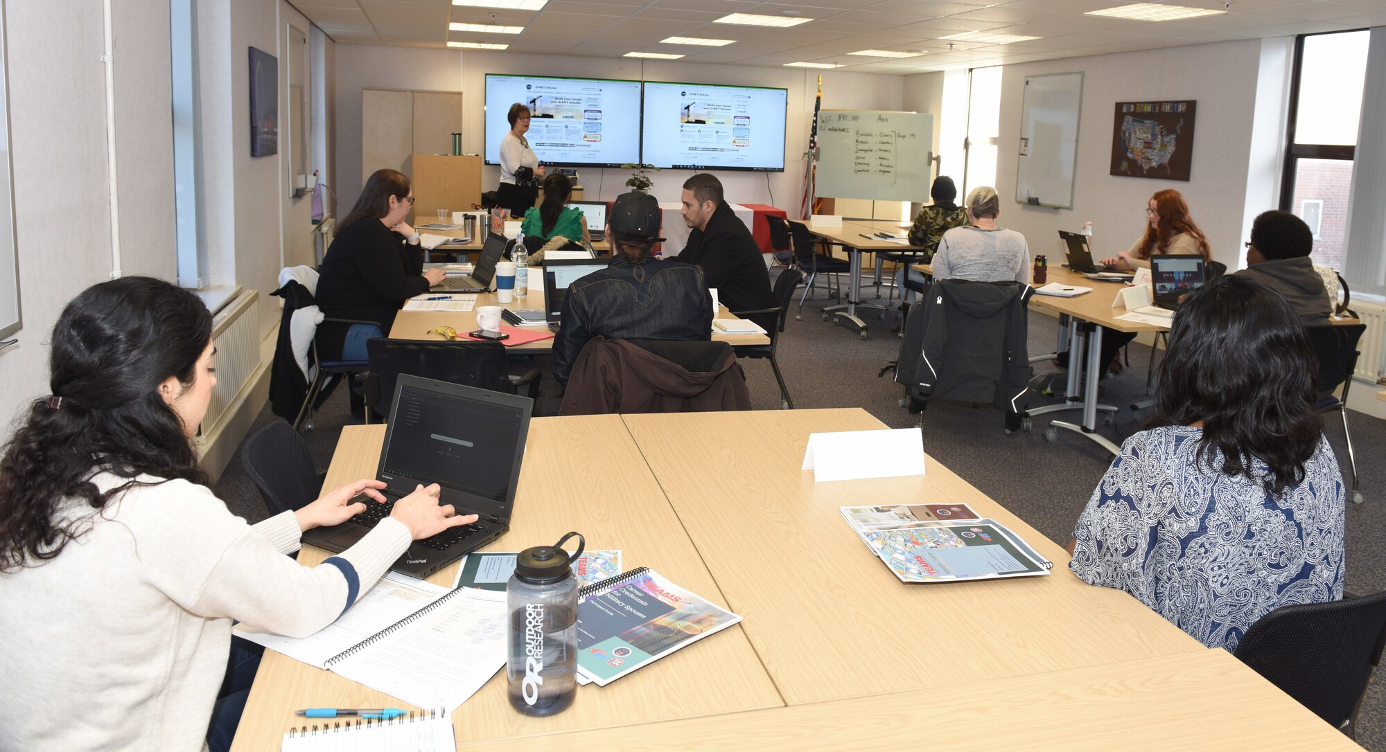 Spouses and former active duty members listen and learn at the Transition Employment Assistance for Military Spouses workshop on RAF Mildenhall, England, Feb. 23, 2022. The workshop was the first in U.S. Air Forces in Europe – Air Forces Africa to be held in-person rather than virtually, at the Airman and Family Readiness Center. (U.S. Air Force photo by Karen Abeyasekere)