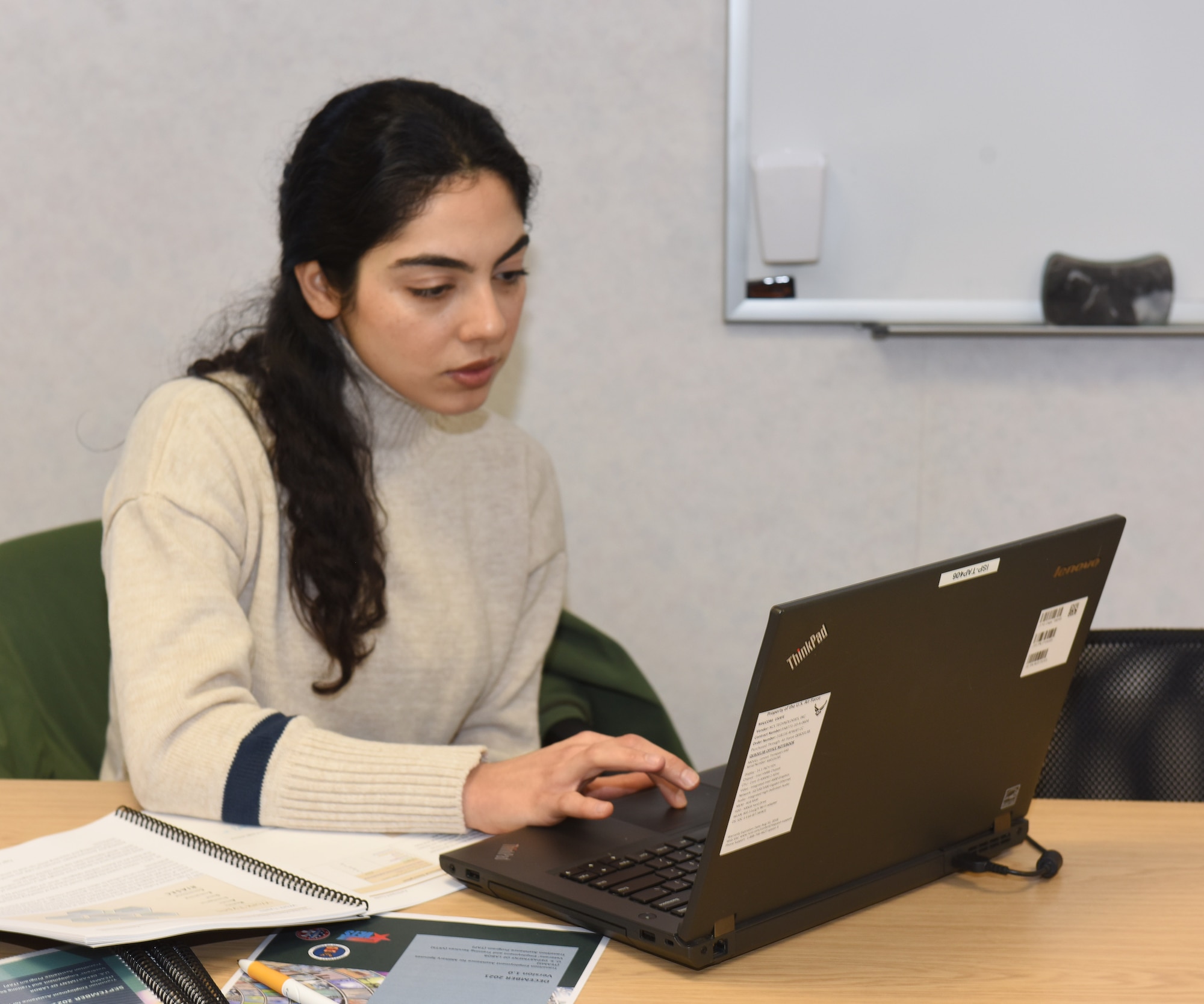 Melis Venturelli, 100th Logistics Readiness Squadron spouse, checks out some of the recommended websites and information at the Transition Employment Assistance for Military Spouses workshop on RAF Mildenhall, England, Feb. 23, 2022. The workshop was the first in U.S. Air Forces in Europe – Air Forces Africa to be held in-person rather than virtually, at the Airman and Family Readiness Center. (U.S. Air Force photo by Karen Abeyasekere)