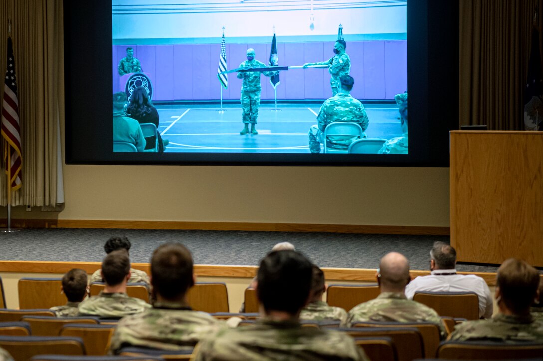 Members of the newly activated 8th Combat Training Squadron observe the deactivation ceremony of their previous unit, 50th Operations Support Squadron, at Schriever Space Force Base, Colorado, Feb. 8, 2022.