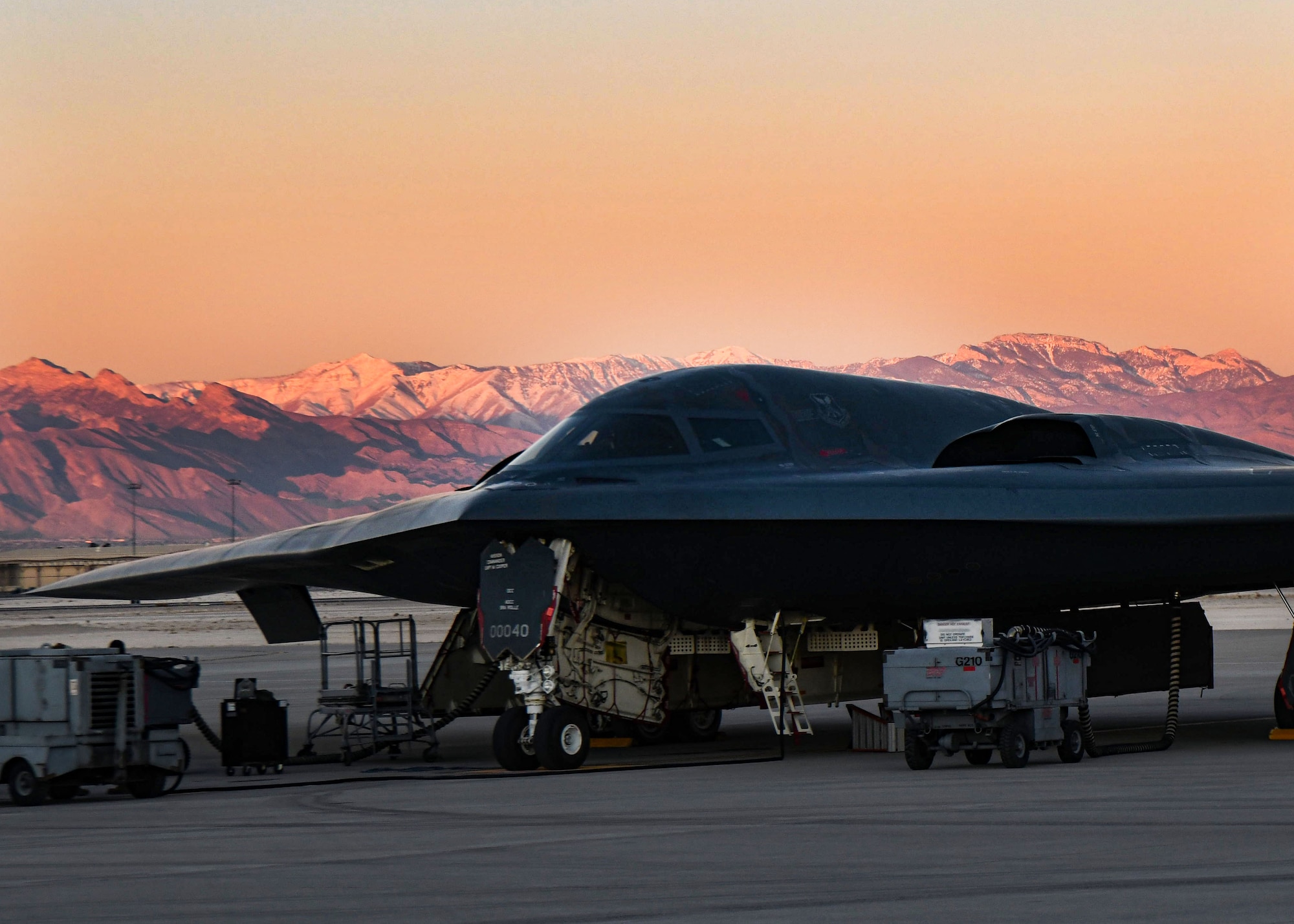 A B-2 Spirit sits on the Nellis Air Force Base flight line.