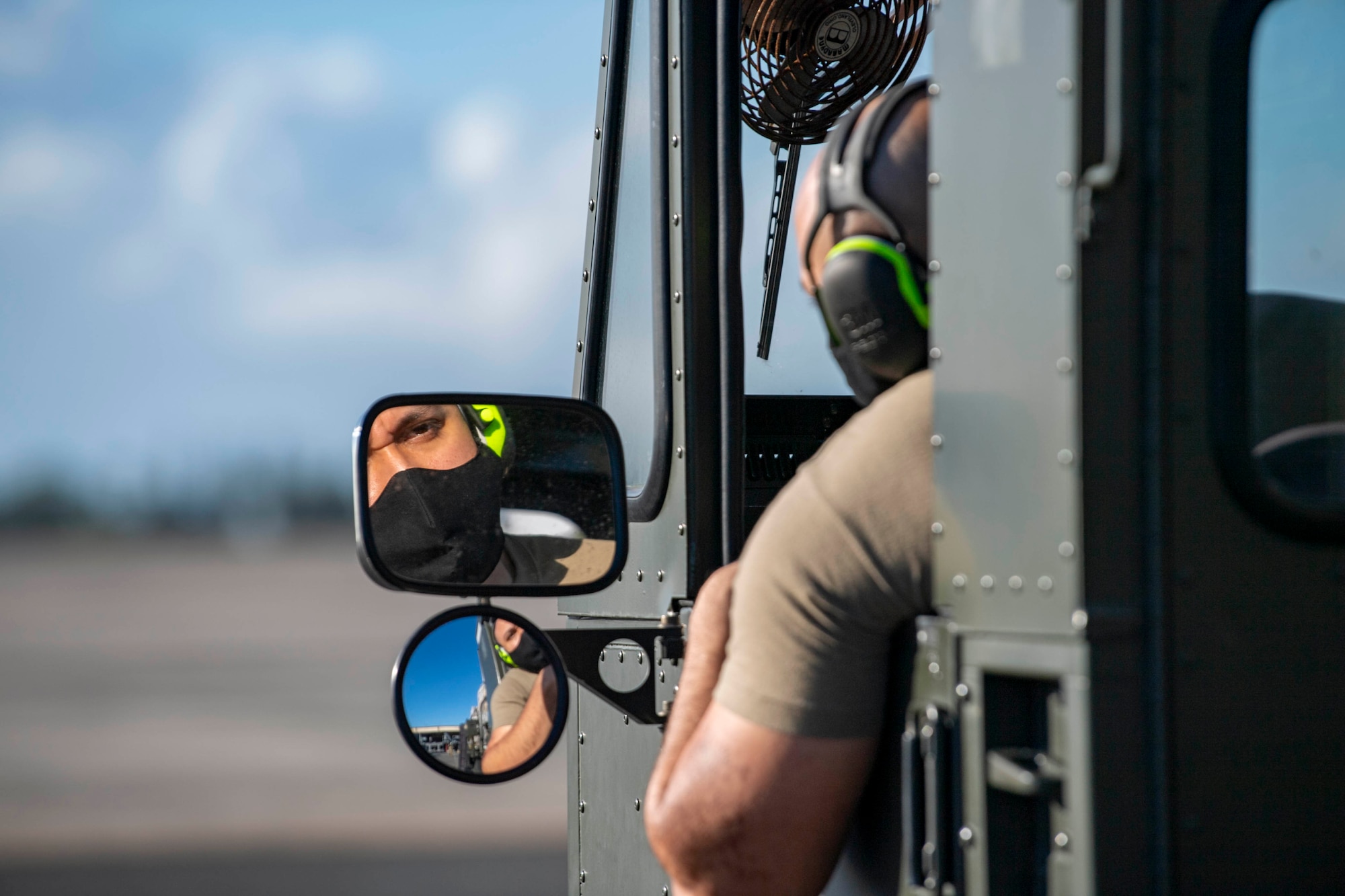 Airman 1st Class Brandon Gonzalez, 735th Air Mobility Squadron (AMS), cargo specialist, maneuvers a 60K loader while at Joint Base Pearl Harbor-Hickam, Jan. 20, 2022.