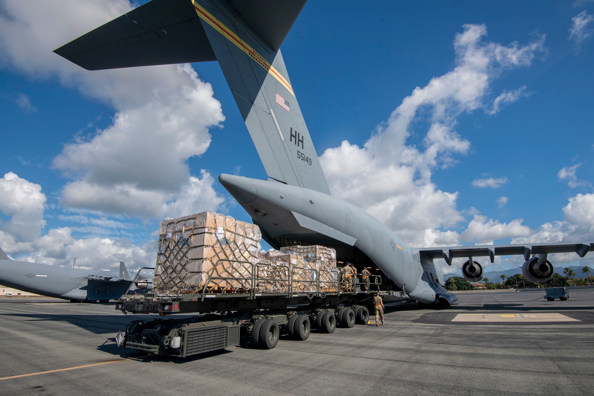 A Hawaii Air National Guard C-17 from the 154th Wing receives cargo, while at Joint Base Pearl Harbor-Hickam, Jan. 20, 2022.