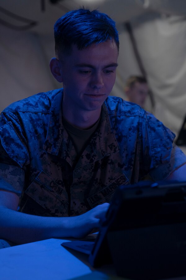 U.S Marine Corps Lance Cpl. William Crum, a 0671 data systems administrator with 9th Communications Battalion (9th Comm), I Marine Expeditionary Force Information Group (I MIG) utilizes the programing language Python to create statistics tracking software and websites at Marine Corps Base Camp Pendleton, California, June 23, 2021. These techniques utilized by 9th Comm assist I MIG in keeping track of worldwide trends in the information environment. (U.S. Marine Corps photo by Lance Cpl. Tyler A. Forti)