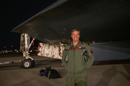 Lt. Col. Drew Irmischer, 131st Bomb Wing pilot, celebrates  surpassing 1,500 flight hours in the B-2 Spirit stealth bomber Jan. 27, 2022, at Whiteman Air Force Base, Missouri. Irmischer is only the 17th aviator to achieve that distinction.