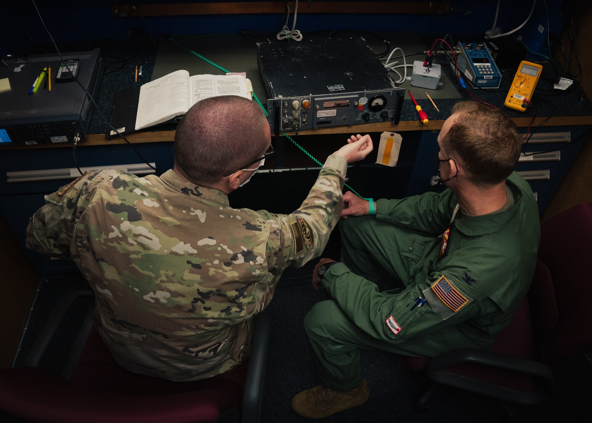 U.S. Air Force Airman 1st Class Ryan McIlroy, 6th Operation Support Squadron Radar Airfield and Weather Systems (RAWS) technician, demos equipment for U.S. Air Force Col. Benjamin Jonsson, 6th Air Refueling Wing commander, at MacDill Air Force Base, Florida, Feb. 24, 2022.