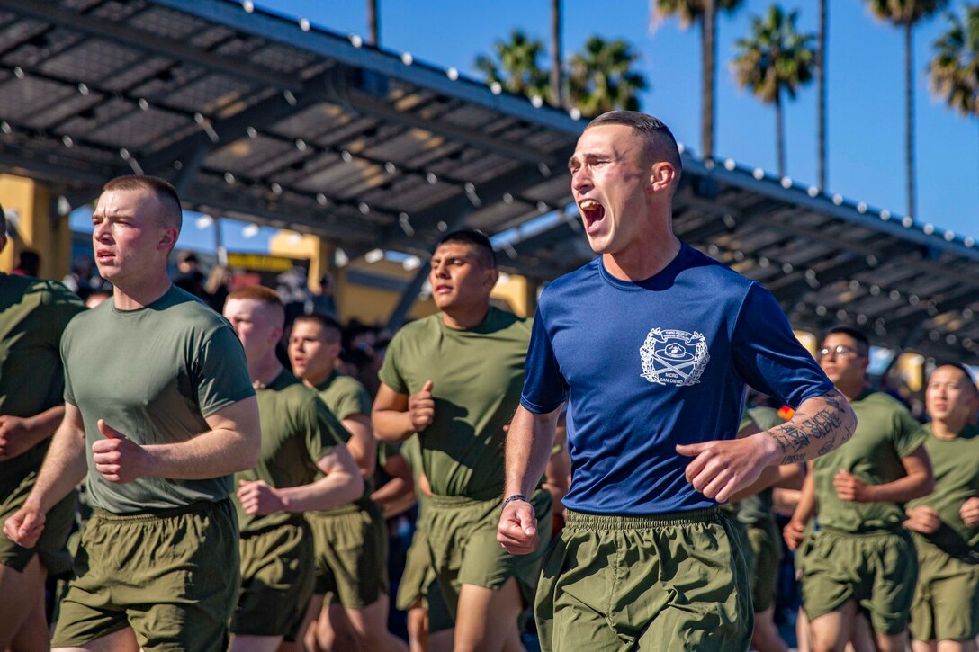 Marines run as a group.