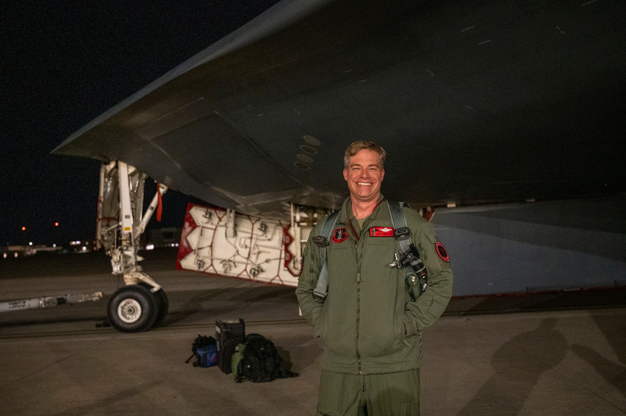 Lt. Col. Drew Irmischer, 131st Bomb Wing pilot, celebrates  surpassing 1,500 flight hours in the B-2 Spirit stealth bomber Jan. 27, 2022, at Whiteman Air Force Base, Missouri. Irmischer is only the 17th aviator to achieve that distinction.