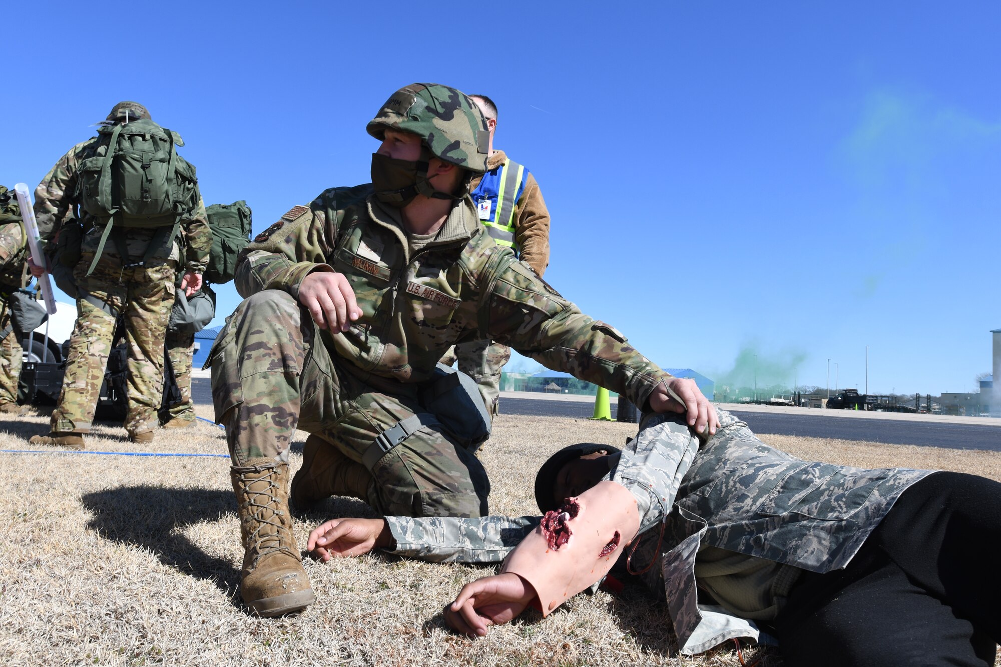 Airman provides simulated medical support.