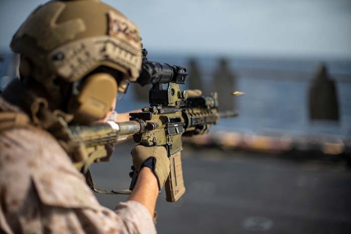 Marine fires M4 carbine