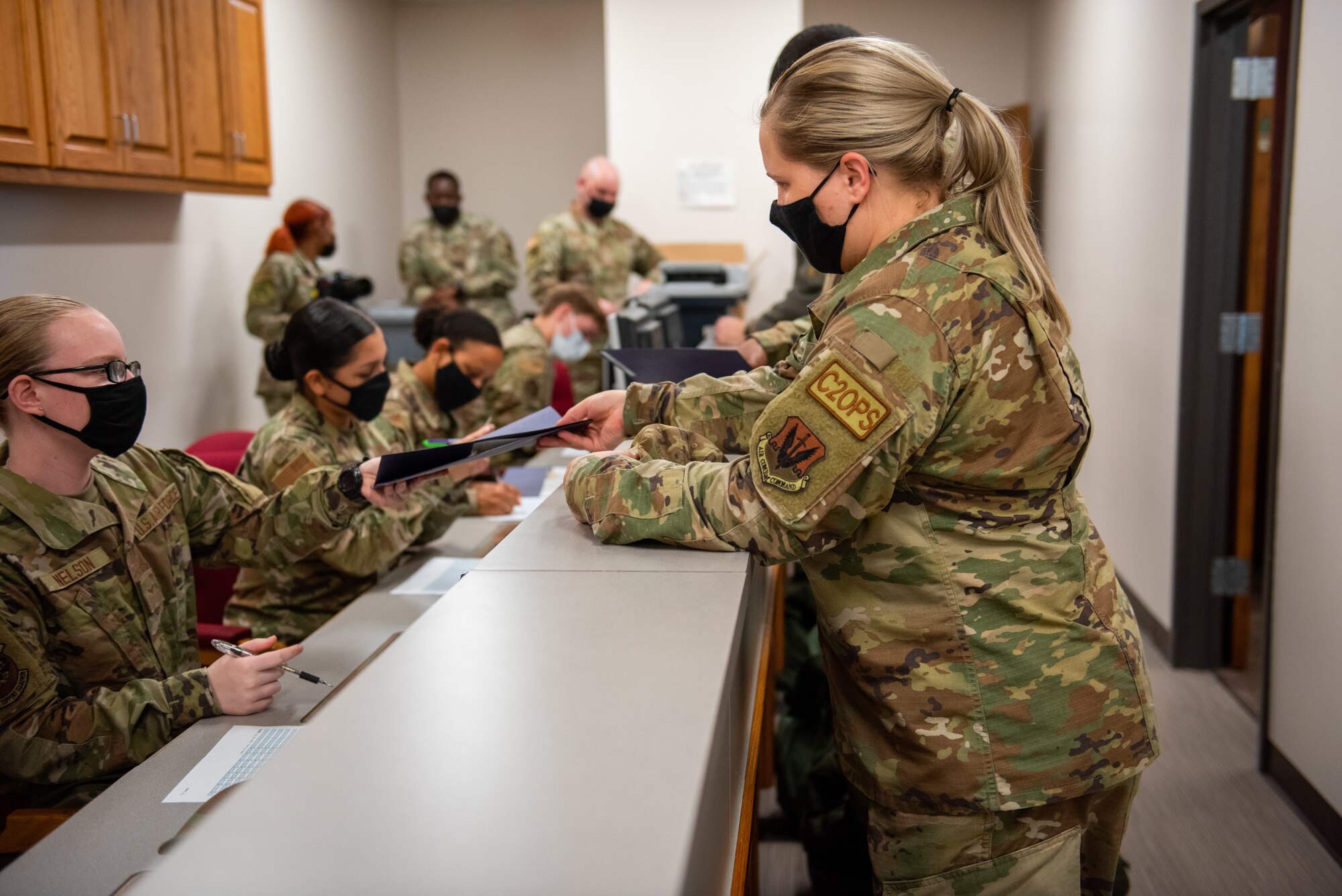 Photo of Airmen standing in a line