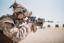 Marine firing a M4 carbine