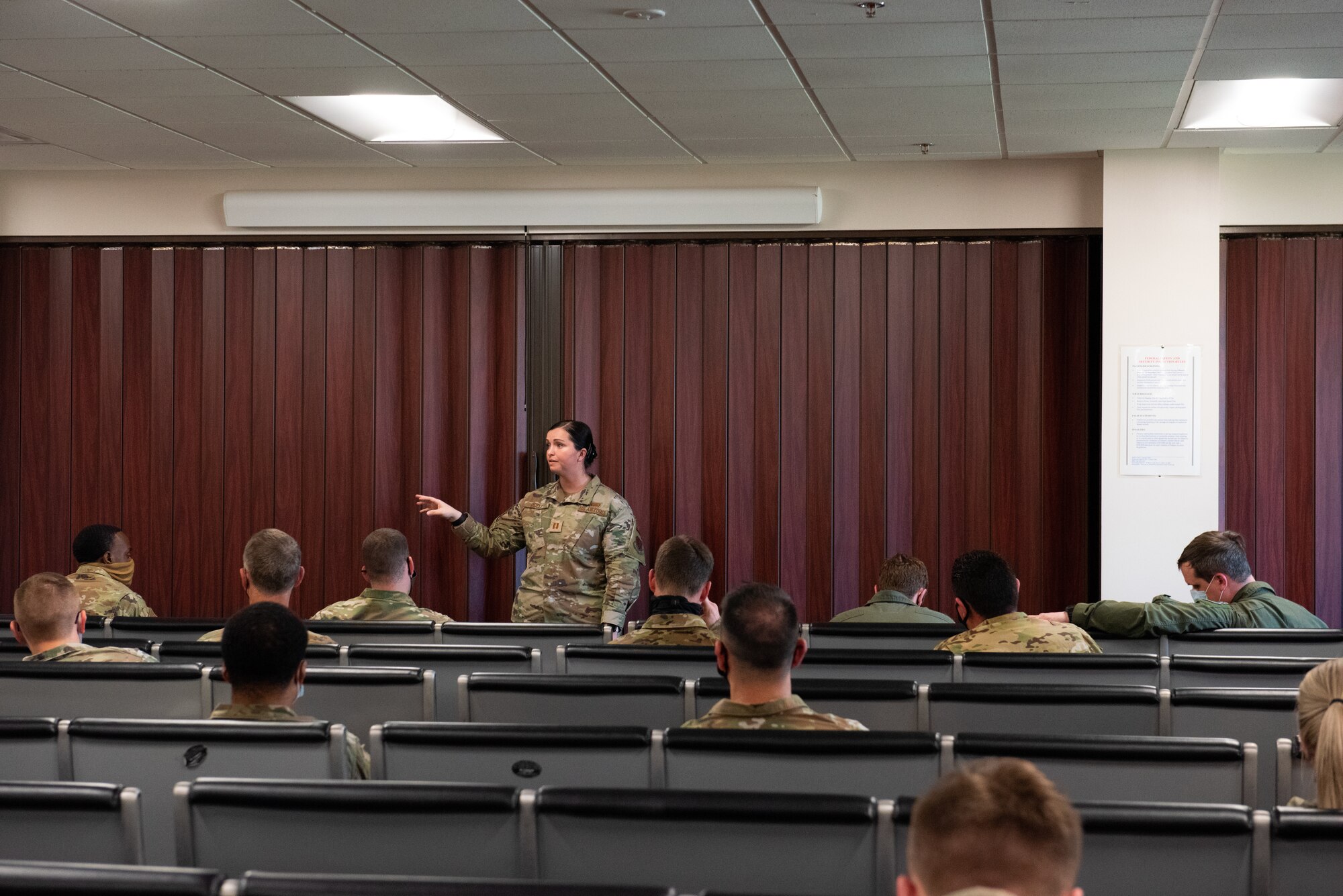 Photo of Airman briefing other Airmen