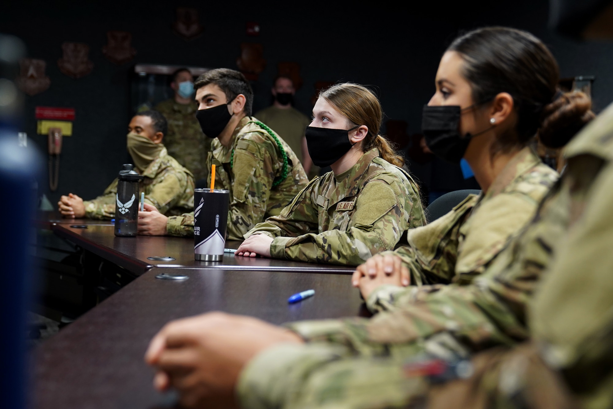 334th Training Squadron students attend a command post operations class inside a classroom dedicated to Master Sgt. Desiree McIntyre, 403rd Wing command and control technician, located in Cody Hall at Keesler Air Force Base, Mississippi, Feb. 25, 2021. McIntyre dedicated 30 years to the command post career field, providing instrumental training techniques and developing the training curriculum. (U.S. Air Force photo by Senior Airman Seth Haddix)