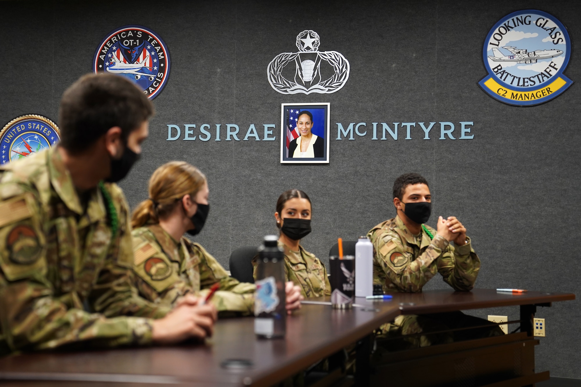 334th Training Squadron students attend a command post operations class inside a classroom dedicated to Master Sgt. Desiree McIntyre, 403rd Wing command and control technician, located in Cody Hall at Keesler Air Force Base, Mississippi, Feb. 25, 2021. McIntyre dedicated 30 years to the command post career field, providing instrumental training techniques and developing the training curriculum. (U.S. Air Force photo by Senior Airman Seth Haddix)