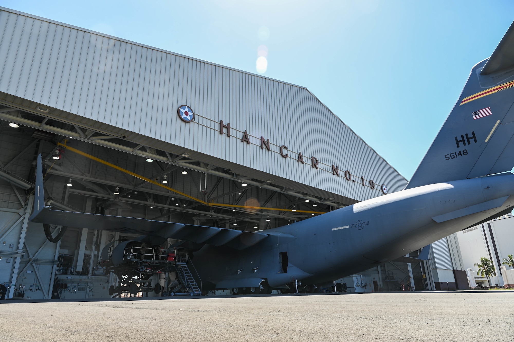 A C-17 Globemaster III undergoes an engine swap in Hangar 19 on Joint Base Pearl Harbor-Hickam, Hawaii, Feb. 23, 2022. Airmen assigned to the 15th Maintenance Group and Hawaii Air National Guard disconnected all attachments on a turbofan engine from the cargo aircraft to be replaced and refurbished. (U.S. Air Force photo by Staff Sgt. Alan Ricker)