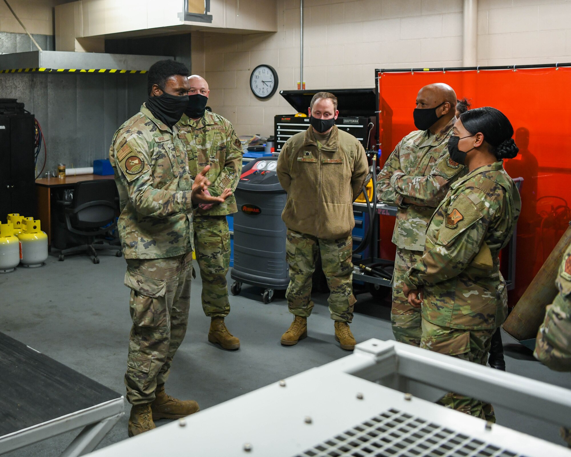 Gen. Anthony Cotton, Air Force Global Strike Command commander and Chief Master Sergeant Melvina Smith, AFGSC command chief, learns about the HVAC systems in the missile alert facilities and launch facilities at Minot Air Force Base, North Dakota, Feb 24, 2022. (U.S. Air Force photo by Airman 1st Class Evan Lichtenhan)