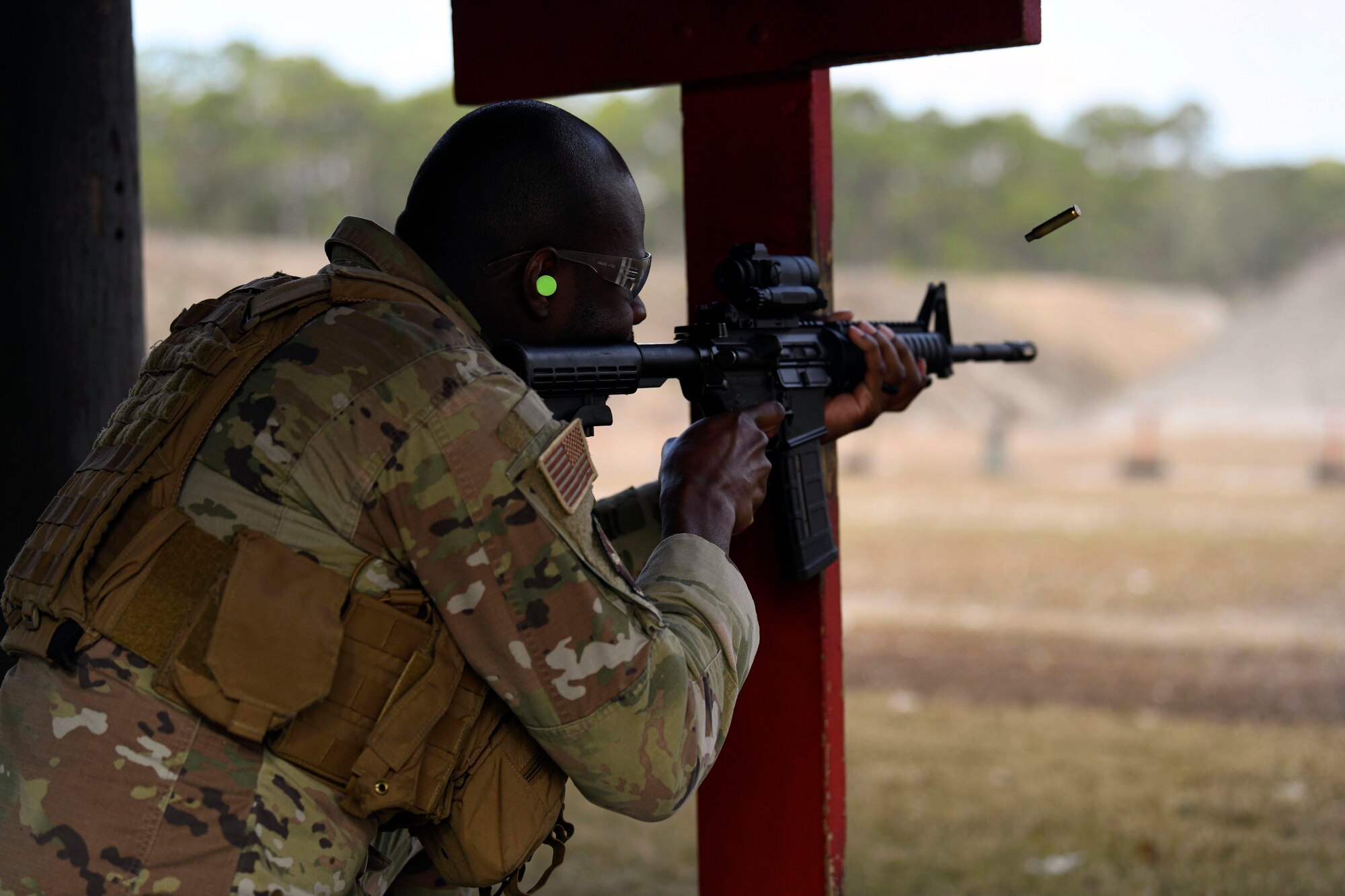 Staff Sgt. Michael Gaither, assigned to the 1st Special Operations Security Forces Squadron, fires an M4 Carbine
