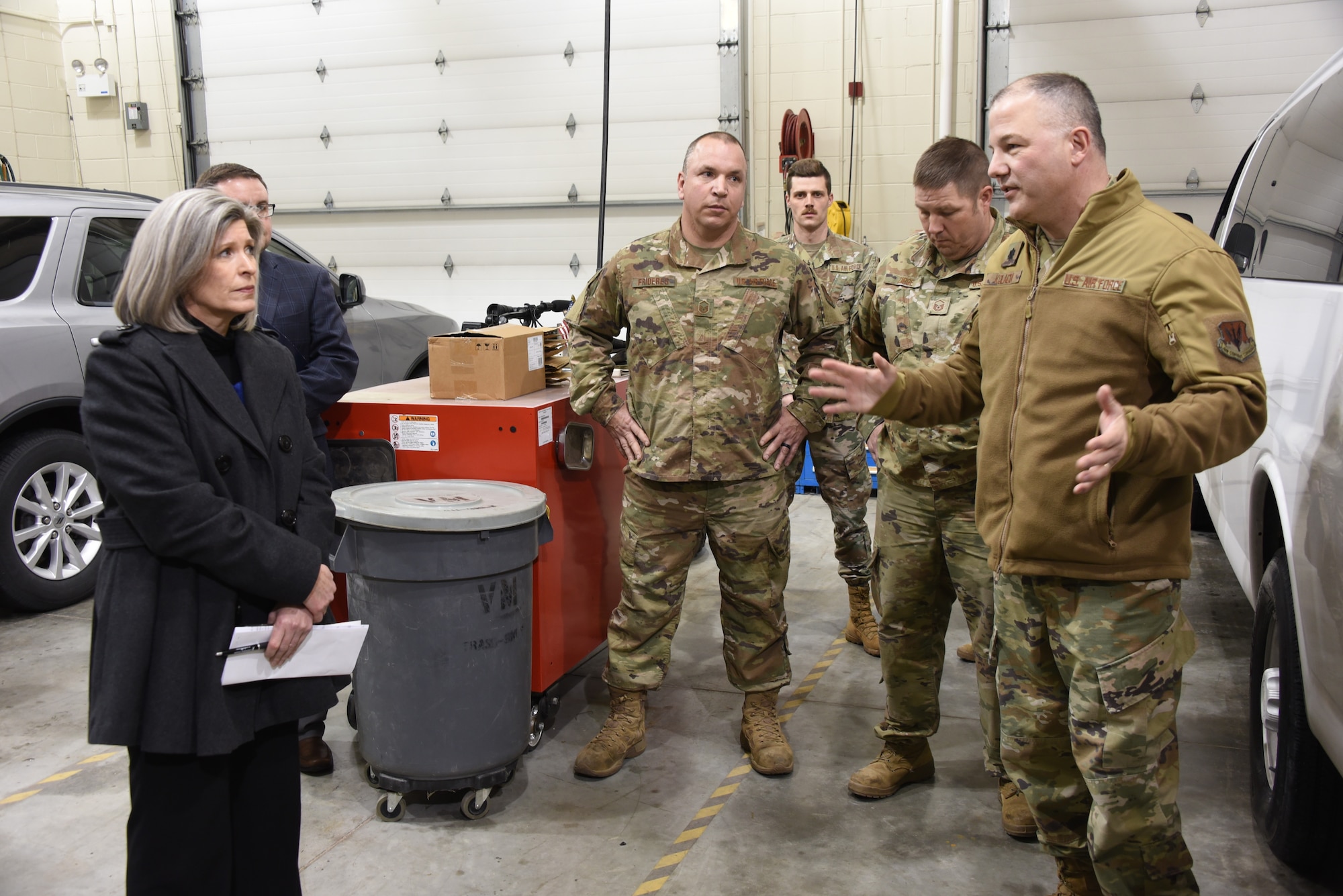 U.S. Senator Joni Ernst talks with Iowa Air National Guard Lt. Colonel Jason Kolacia 133rd Test Squadron Commander.