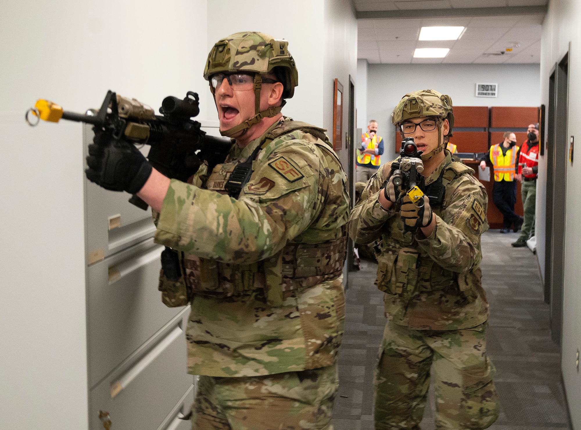 Senior Airman Andrew Barnes, 88th Security Forces Squadron, takes point as Defenders respond to an active-shooter exercise Feb. 23, 2022, at Wright-Patterson Air Force Base, Ohio. The exercise was held as part of the base’s regularly scheduled training to prepare for possible emergency scenarios. (U.S. Air Force photo by R.J. Oriez)