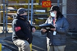 Aquiles Faustino, right, a safety specialist at Fleet Readiness Center East (FRCE), speaks with Samuel Foreman, an electrical equipment repairer at FRCE, during a safety site survey. Site surveys like these play an important role in FRCE’s safety program. FRCE closed out calendar year 2021 with the lowest number of Occupational Safety and Health Administration (OSHA) recordable mishaps in the depot’s history.