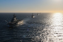 The Italian aircraft carrier ITS Giuseppe Garibaldi (C 551) sails in formation with Blue ridge-class amphibious command ship USS Mount Whitney (LCC 20) and the guided-missile destroyers USS Roosevelt (DDG 80) and USS Forrest Sherman (DDG 98), Feb 22.