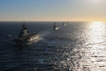 The Italian aircraft carrier ITS Giuseppe Garibaldi (C 551) sails in formation with Blue ridge-class amphibious command ship USS Mount Whitney (LCC 20) and the guided-missile destroyers USS Roosevelt (DDG 80) and USS Forrest Sherman (DDG 98), Feb 22.