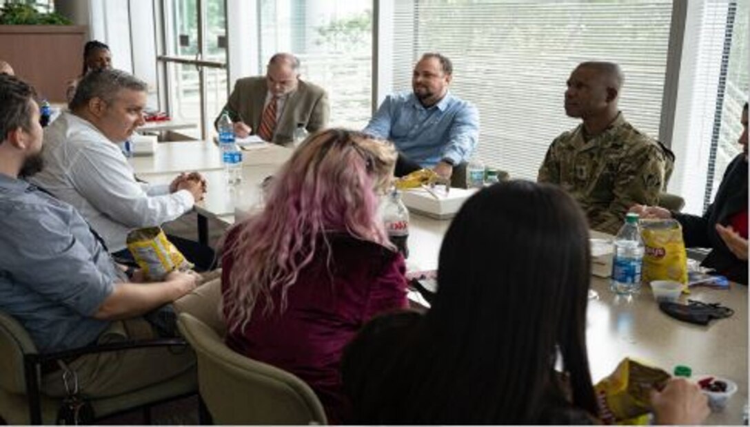 The U.S. Army Corps of Engineers' senior enlisted adviser Command Sgt. Maj. Patrickson Toussaint poses with the Jacksonville District Leadership Development Program team during a recent visit to the Jacksonville District February 16-17.