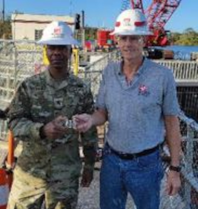 The U.S. Army Corps of Engineers' senior enlisted adviser Command Sgt. Maj. Patrickson Toussaint poses with the Jacksonville District Leadership Development Program team during a recent visit to the Jacksonville District February 16-17.