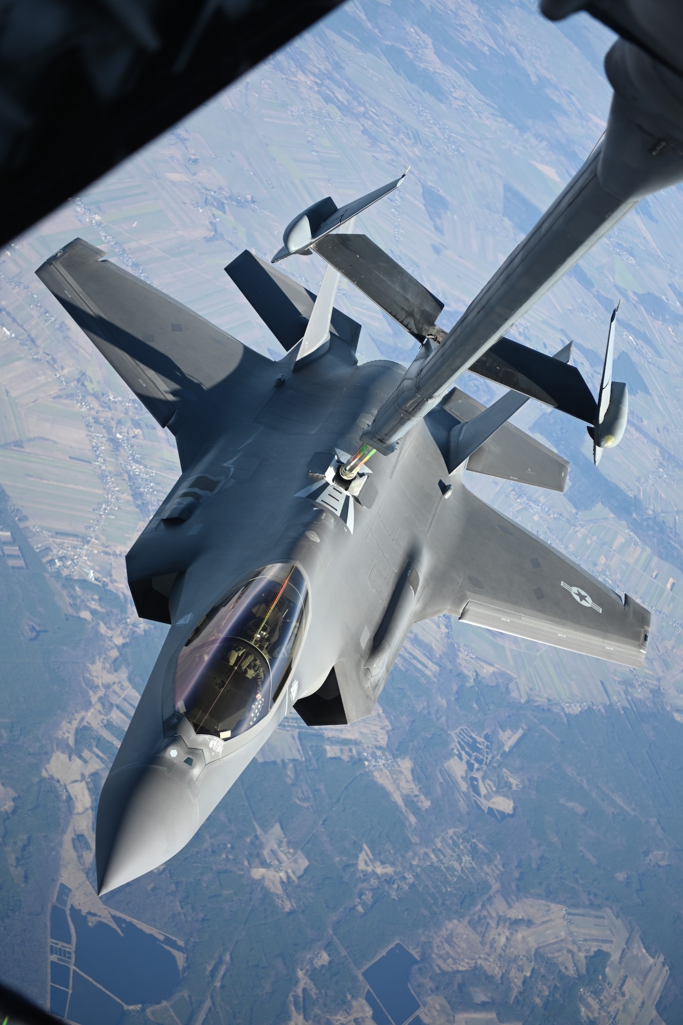 A U.S. Air Force F-35 Lightning II aircraft assigned to the 34th Fighter Squadron receives fuel from a KC-10 Extender aircraft over Poland, Feb. 24, 2022. The F-35 aircraft affords NATO leaders the flexibility to project power and assert air dominance in highly contested environments. (U.S. Air Force photo by Senior Airman Joseph Barron)