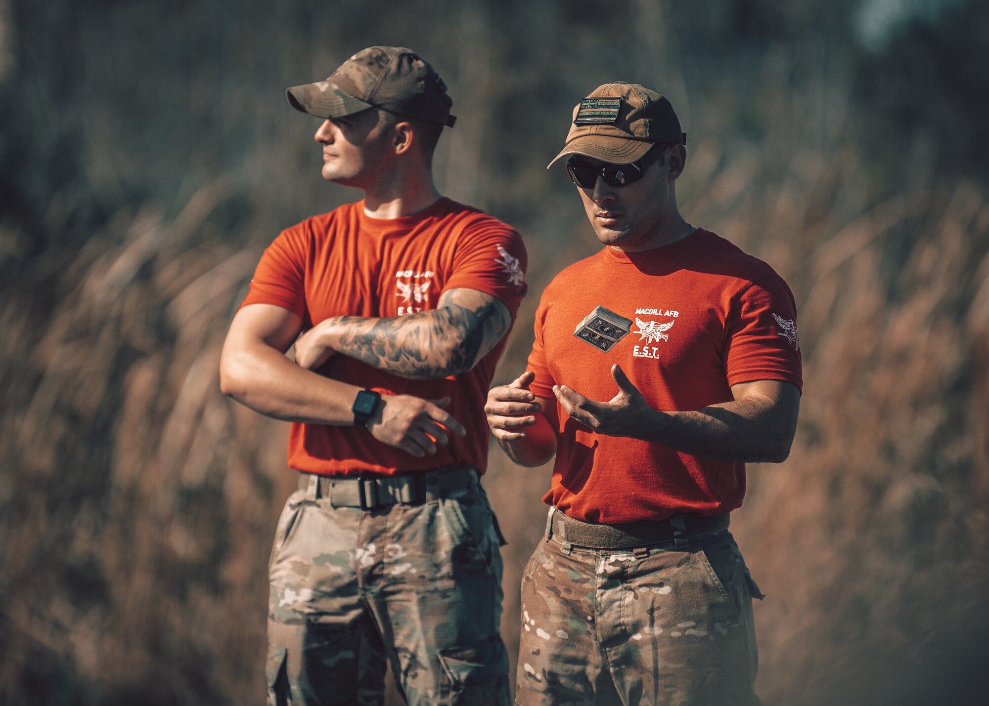 U.S. Air Force Staff Sgts. Michael Lex (left) and Travis Somera (right), Emergency Services Team (EST) leads assigned to the 6th Security Forces Squadron, facilitate EST tryouts as cadre at MacDill Air Force Base, Florida, Feb. 4, 2022.