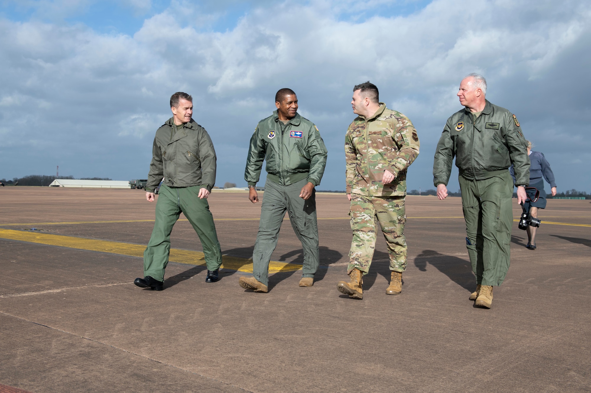 U.S. Air Force Maj. Gen. Randall Reed, center left, Third Air Force commander, greets Col. Brian Filler, center right, 501st Combat Support Wing commander, at RAF Fairford, England, Feb. 21, 2022. Reed was at Fairford to participate in briefings with representatives from allied nations about the capabilities and operations of U.S. Air Forces in the United Kingdom. (U.S. Air Force photo by Senior Airman Jennifer Zima)