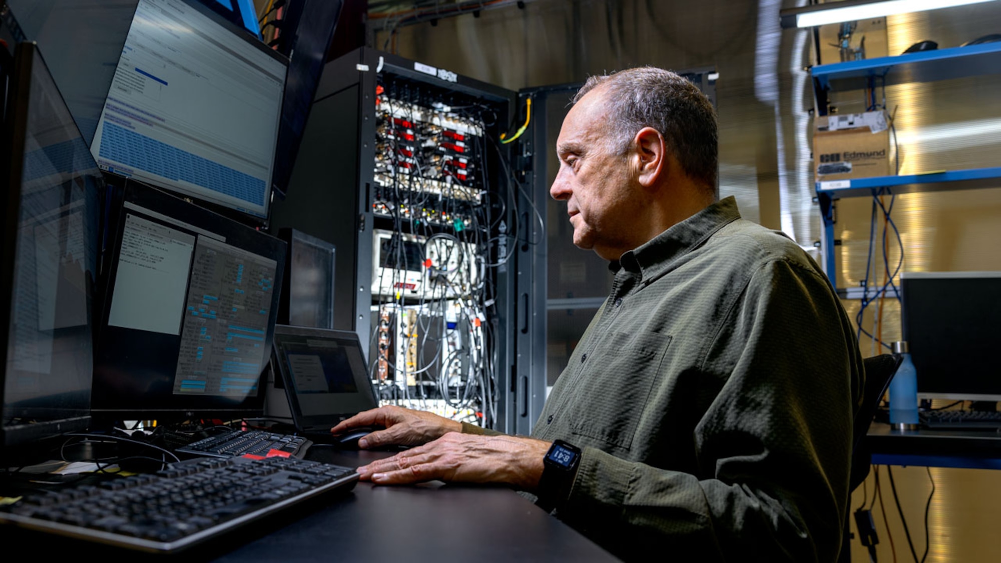 Matt Miller, professor of mechanical and aerospace engineering in Cornell's College of Engineering, at work in the Cornell High Energy Synchrotron Source (CHESS). Miller is principal investigator for the Materials Solutions Network at CHESS, which provides dedicated access to two X-ray beamlines for the Air Force and other Department of Defense researchers, as well as original equipment manufacturers, to improve the performance and safety of new and existing materials and designs for military components, targeting issues such as fatigue and residual stress. (Courtesy photo Cornell University/Jason Koski)