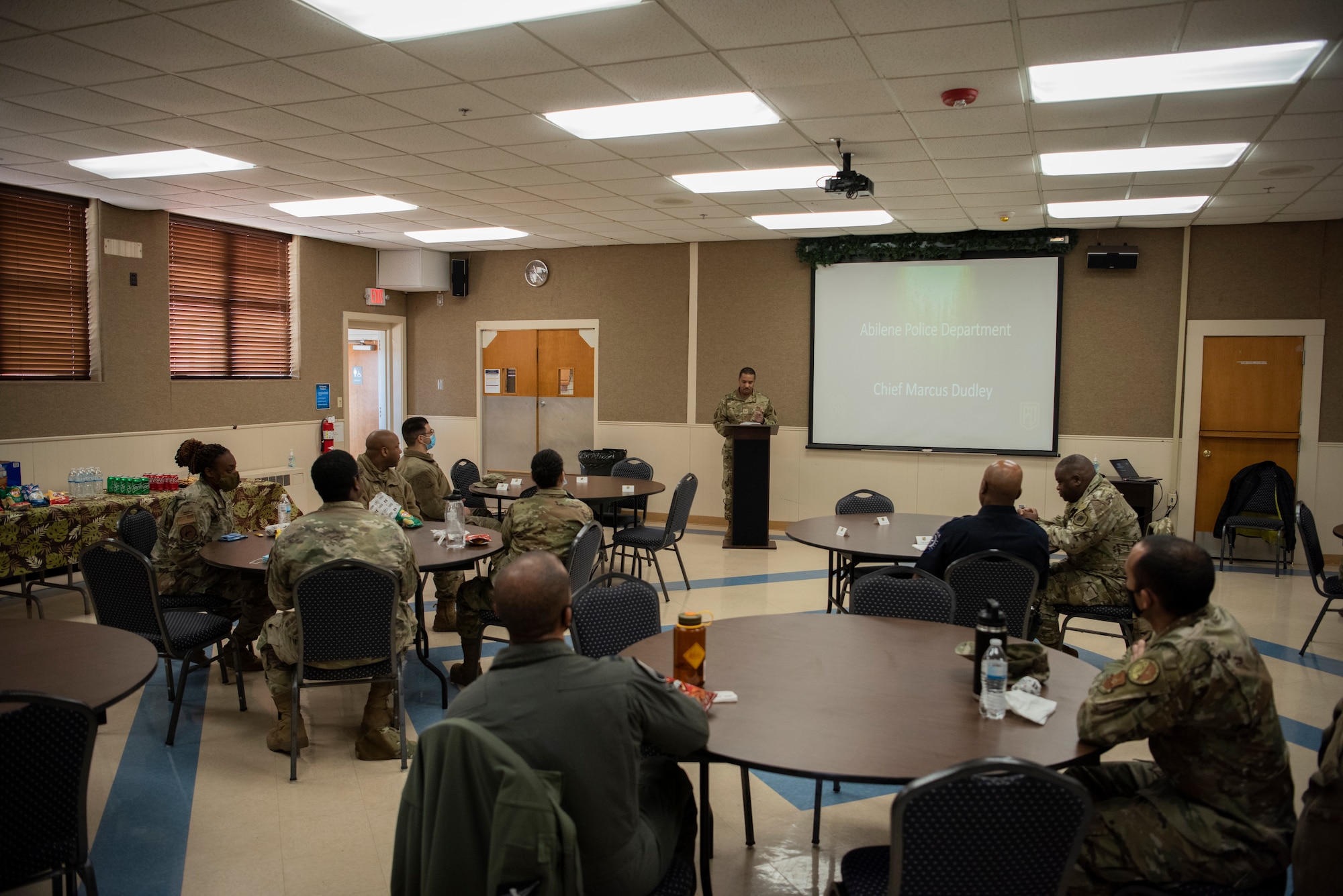 Members of Team Dyess and the Abilene community listen to a speech during a Black History Month luncheon at Dyess Air Force Base, Texas, Feb. 22, 2022. During the luncheon, Airmen and the Abilene Police Chief, Marcus Dudley, spoke about the importance of celebrating black history.  (U.S. Air Force photo by Airman 1st Class Ryan Hayman)