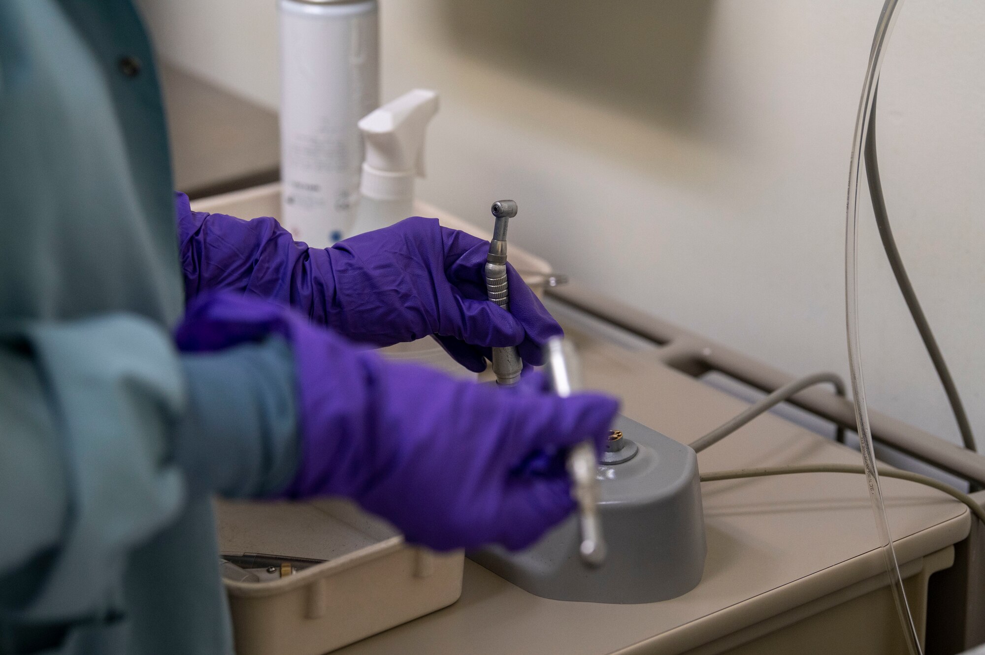 Tabitha Womack, 4th Operational Medical Readiness Squadron dental assistant, uses a lubrication machine at Seymour Johnson Air Force Base, North Carolina, Feb. 24, 2022. The lubrication machine is used during sanitation to keep the instruments in working condition. (U.S. Air Force photo by Airman 1st Class Kevin Holloway)